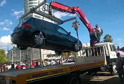 It is not illegal for City of Harare to clamp and tow away vehicles 